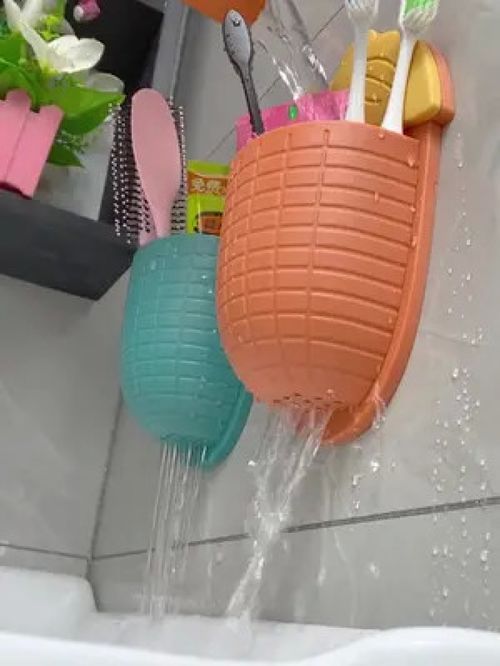 底部瀝水干凈衛生,免打孔粘貼安裝瀝水玉米收納杯,收納洗漱用品和廚房里的筷子勺子非常方便 瀝水玉米收納杯